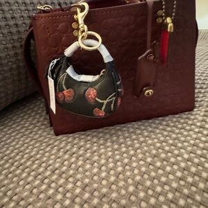 Coach CDB52 Carmen Bag Charm With Cherry Print Smooth Leather Gold/Black Multi